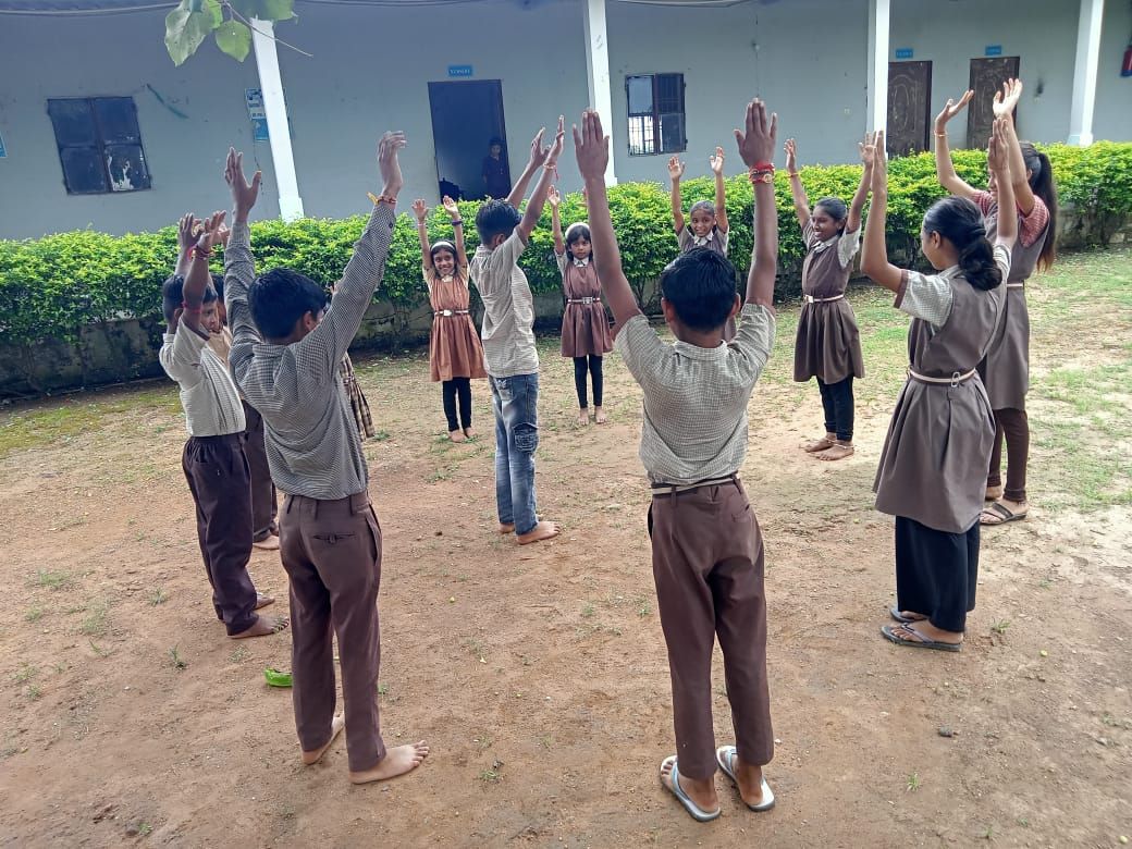 Children doing exercises in the playground