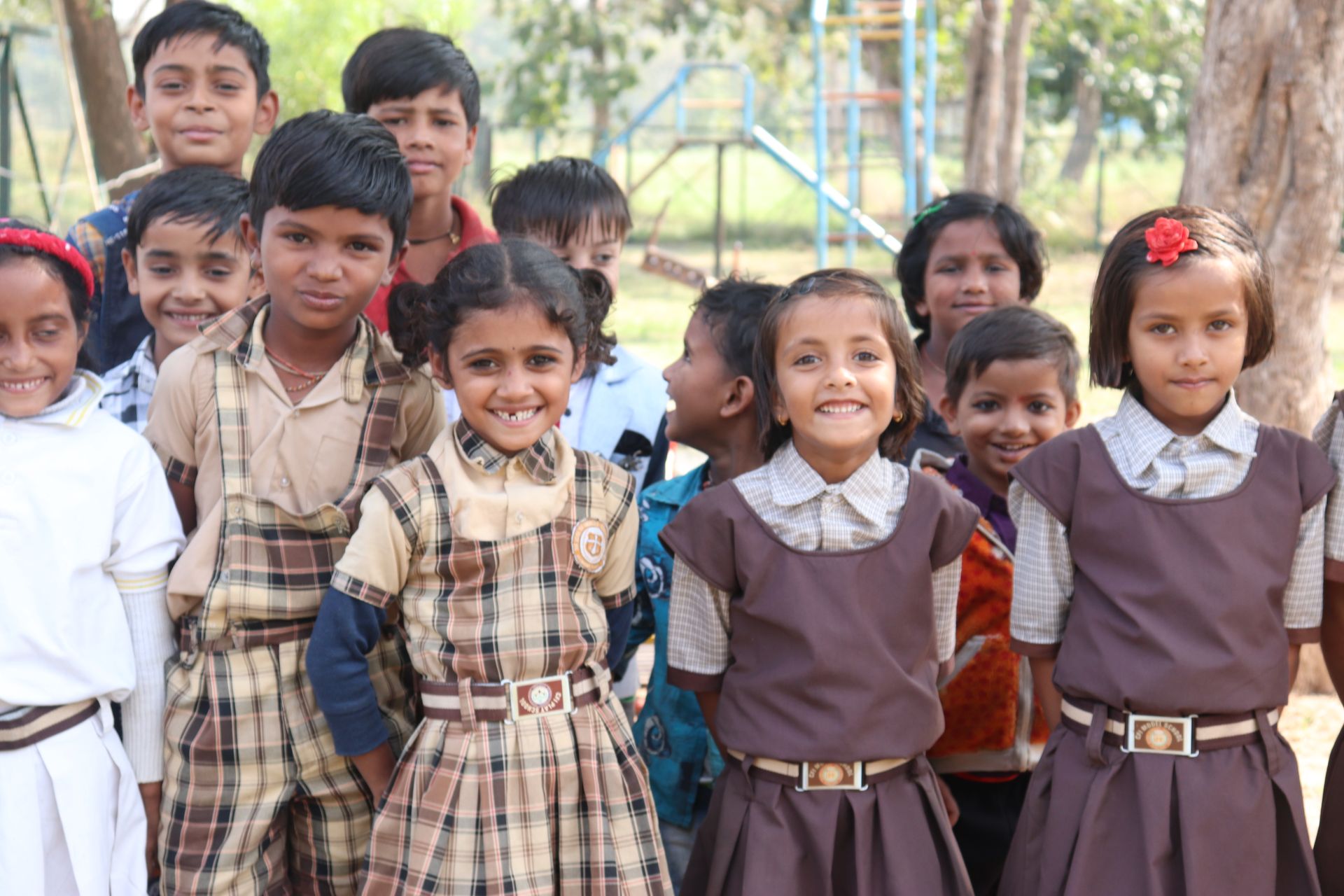 Happy students of CFI Model School smiling together