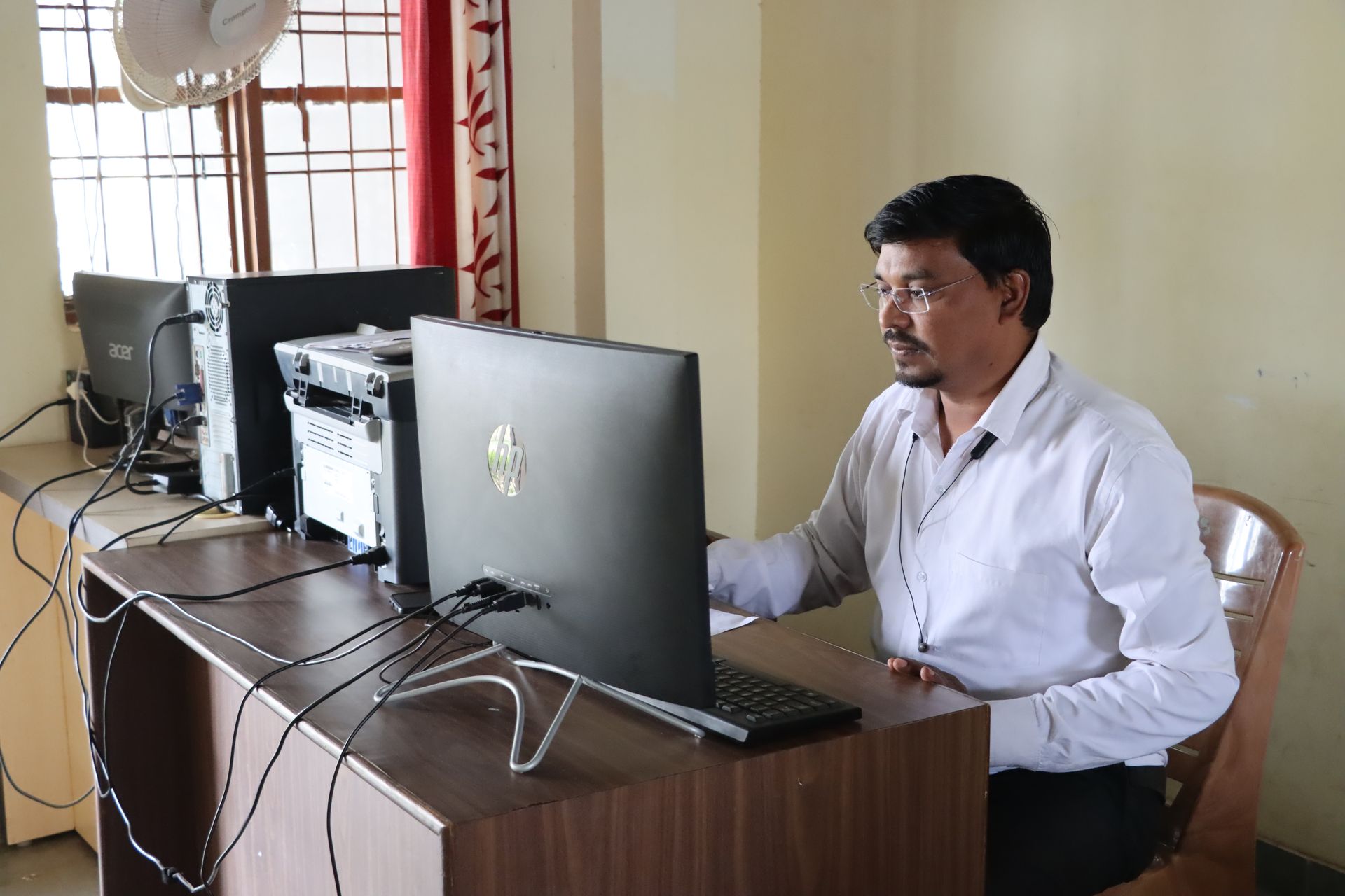 Teacher working in the computer lab